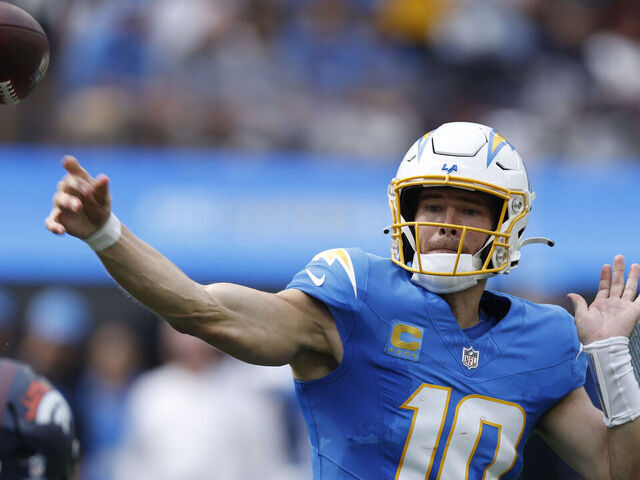 INGLEWOOD, CALIFORNIA - SEPTEMBER 21: Justin Herbert #10 of the Los Angeles Chargers passes the ball against the Denver Broncos during the second quarter at SoFi Stadium on September 21, 2025 in Inglewood, California.
