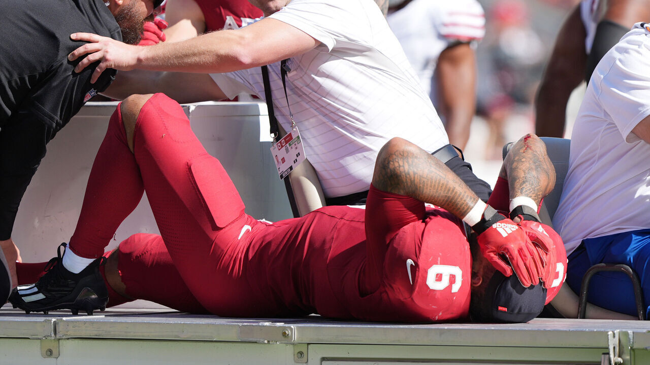 SANTA CLARA, CALIFORNIA - SEPTEMBER 21: James Conner #6 of the Arizona Cardinals is taken off the field on a cart during the third quarter against the San Francisco 49ers at Levi's Stadium on September 21, 2025 in Santa Clara, California.