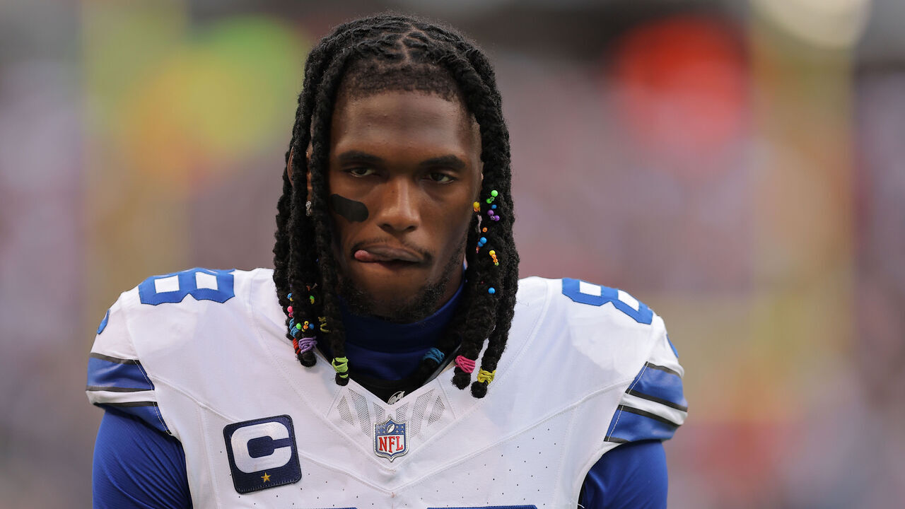 CHICAGO, IL - SEPTEMBER 21: Ceedee Lamb #88 of the Dallas Cowboys looks on from the sideline during the second half against the Chicago Bears on September 21, 2025 at Soldier Field in Chicago, Illinois.