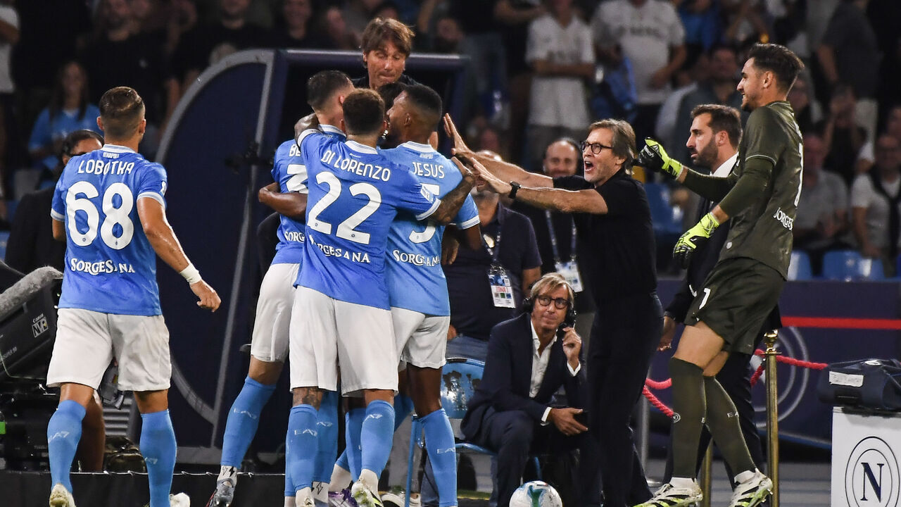 NAPLES, ITALY - SEPTEMBER 22: Lorenzo Lucca of SSC Napoli celebrates with team mates and Antonio Conte after scoring a goal to make it 3-1 during the Serie A match between SSC Napoli and Pisa SC at Stadio Diego Armando Maradona on September 22, 2025 in Naples, Italy.