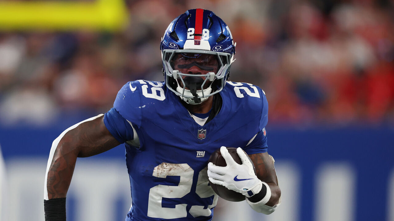EAST RUTHERFORD, NEW JERSEY - SEPTEMBER 21: Tyrone Tracy Jr. #29 of the New York Giants rushes against the Kansas City Chiefs during the first quarter at MetLife Stadium on September 21, 2025 in East Rutherford, New Jersey.