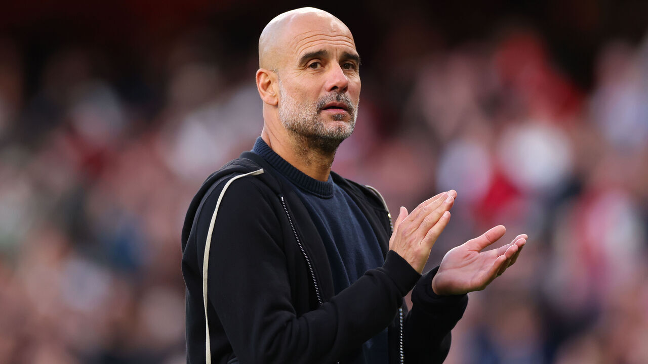 LONDON, ENGLAND - SEPTEMBER 21: Pep Guardiola the head coach / manager of Manchester City during the Premier League match between Arsenal and Manchester City at Emirates Stadium on September 21, 2025 in London, England.