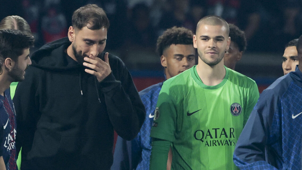 PARIS, FRANCE - AUGUST 22: PSG goalkeepers Gianluigi Donnarumma and Lucas Chevalier following the Ligue 1 McDonald's football match between Paris Saint-Germain (PSG) and SCO Angers at Parc des Princes stadium on August 22, 2025 in Paris, France.