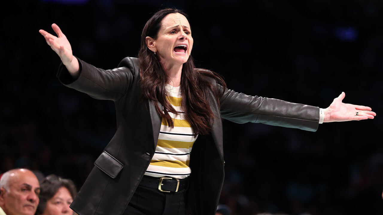 NEW YORK, NEW YORK - SEPTEMBER 09: Head coach Sandy Brondello of the New York Liberty reacts during the first half against the Washington Mystics at Barclays Center on September 09, 2025 in the Brooklyn borough of New York City.