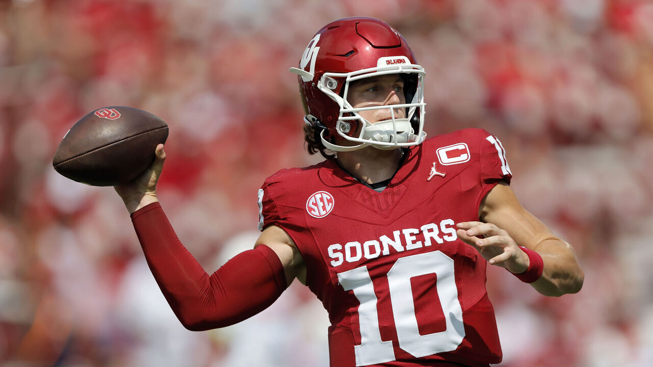 NORMAN, OKLAHOMA - SEPTEMBER 20: Quarterback John Mateer #10 of the Oklahoma Sooners throws a pass before a game against the Auburn Tigers at Gaylord Family Oklahoma Memorial Stadium on September 20, 2025 in Norman, Oklahoma.