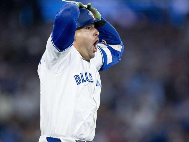 TORONTO, ON - SEPTEMBER 23: George Springer #4 of the Toronto Blue Jays reacts after hitting a foul ball during the second inning of a game against the Boston Red Sox on September 23, 2025 at Rogers Centre in Toronto, Ontario.