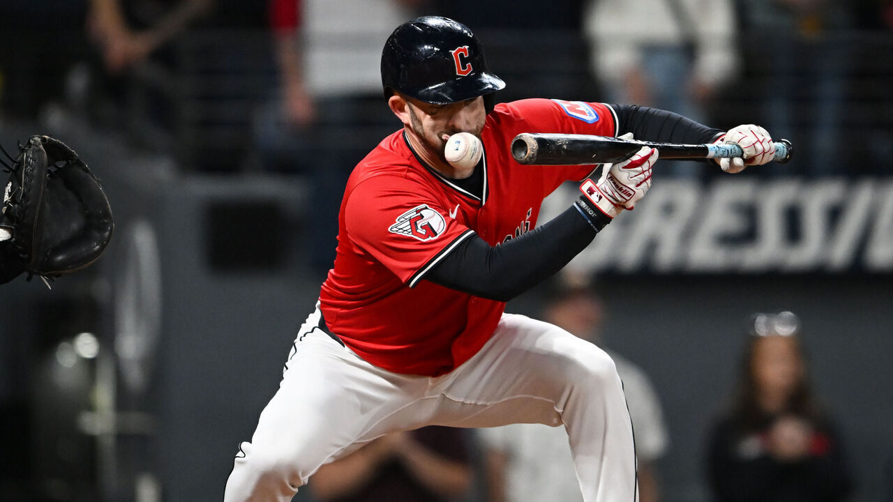 CLEVELAND, OHIO - SEPTEMBER 23: David Fry #6 of the Cleveland Guardians fouls a bunt off his face during the sixth inning against the Detroit Tigers at Progressive Field on September 23, 2025 in Cleveland, Ohio.