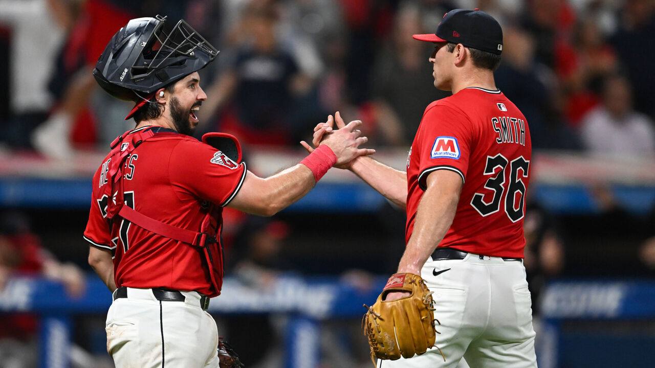 CLEVELAND, OHIO - SEPTEMBER 23: Austin Hedges #27 and Cade Smith #36 of the Cleveland Guardians celebrate the team's 5-2 win over the Detroit Tigers at Progressive Field on September 23, 2025 in Cleveland, Ohio.