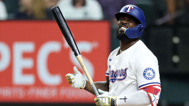 ARLINGTON, TEXAS - SEPTEMBER 23: Adolis García #53 of the Texas Rangers reacts to a called strike during the second inning against the Minnesota Twins at Globe Life Field on September 23, 2025 in Arlington, Texas.