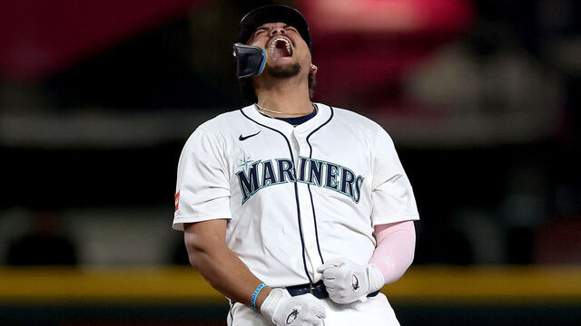 SEATTLE, WASHINGTON - SEPTEMBER 23: Josh Naylor #12 of the Seattle Mariners celebrates his three-run RBI double against the Colorado Rockies during the eighth inning at T-Mobile Park on September 23, 2025 in Seattle, Washington.