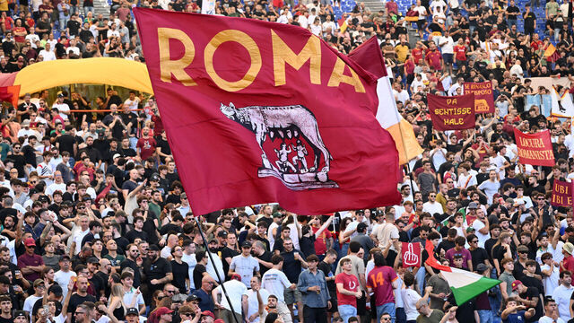 ROME, ITALY - SEPTEMBER 21: Fans of AS Roma show their support during of the Serie A match between SS Lazio and AS Roma at Stadio Olimpico on September 21, 2025 in Rome, Italy.