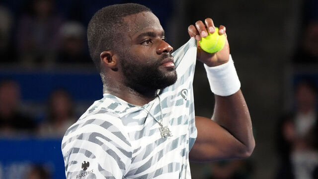 TOKYO, JAPAN - SEPTEMBER 24: Frances Tiafoe of the United States looks on Marton Fucsovics of Hungary during the Singles Round of 32 on day one of Kinoshita Group Japan Open at Ariake Colosseum on September 24, 2025 in Tokyo, Japan.