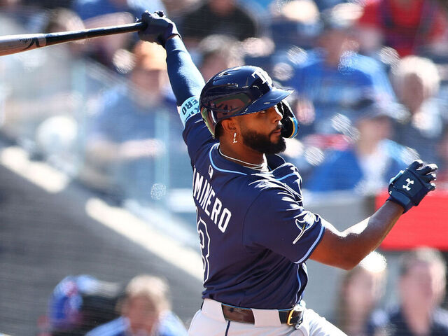 TORONTO, ON - MAY 15: Junior Caminero #13 of the Tampa Bay Rays bats during a game against the Toronto Blue Jays at Rogers Centre on May 15, 2025 in Toronto, Ontario, Canada.
