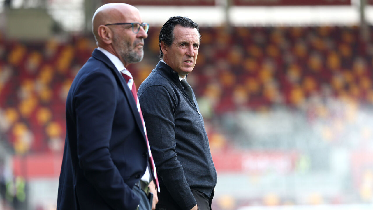 BRENTFORD, ENGLAND - AUGUST 23: Unai Emery, Manager of Aston Villa, looks on alongside Ramon Rodriguez Verdejo 'Monchi', President of Football Operations at Aston Villa, during the pitch inspection prior to the Premier League match between Brentford and Aston Villa at Gtech Community Stadium on August 23, 2025 in Brentford, England.