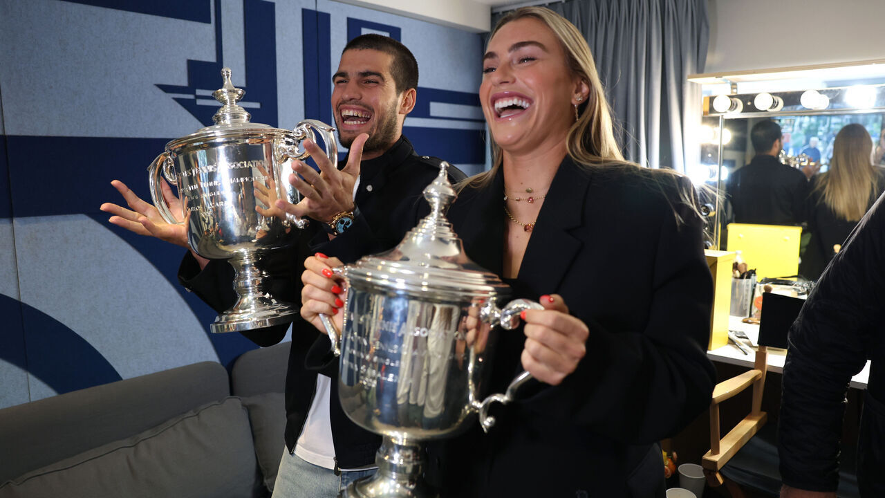 NEW YORK, NEW YORK - SEPTEMBER 08: US Open 2025 Champions Carlos Alcaraz of Spain and Aryna Sabalenka laugh while making a Tik Tok during their appearance on the Today Show following following their victories in the Men's and Women's Singles finals at Rockefeller Plaza on September 08, 2025 in New York City.
