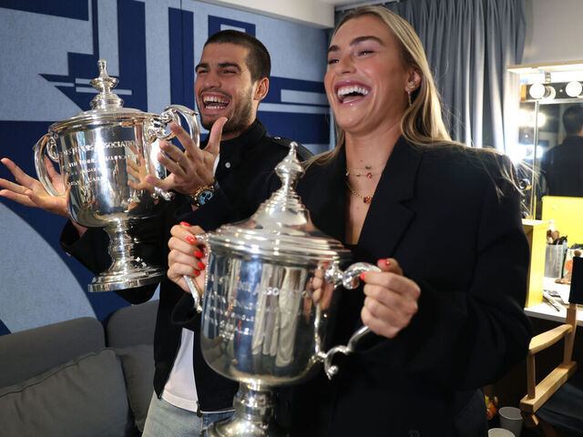 NEW YORK, NEW YORK - SEPTEMBER 08: US Open 2025 Champions Carlos Alcaraz of Spain and Aryna Sabalenka laugh while making a Tik Tok during their appearance on the Today Show following following their victories in the Men's and Women's Singles finals at Rockefeller Plaza on September 08, 2025 in New York City.