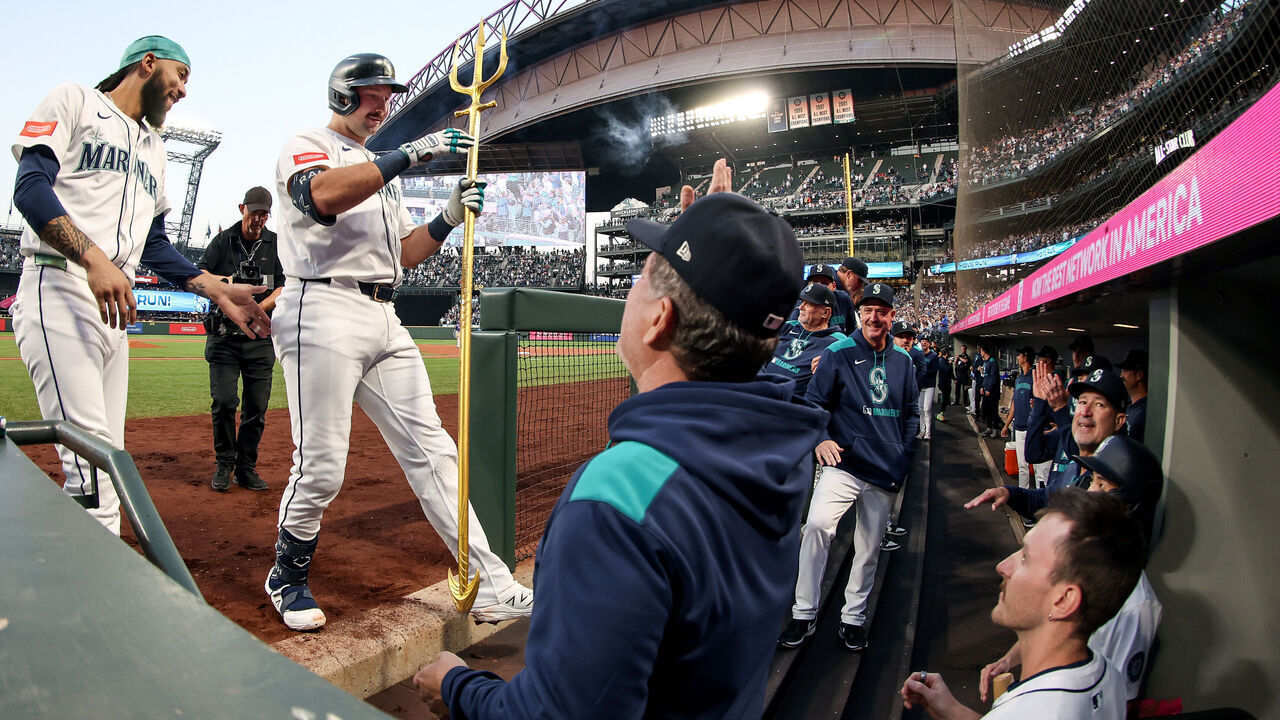 SEATTLE, WASHINGTON - SEPTEMBER 24: Cal Raleigh #29 of the Seattle Mariners watches his solo home run, his 59th of the season, during the first inning against the Colorado Rockies at T-Mobile Park on September 24, 2025 in Seattle, Washington.