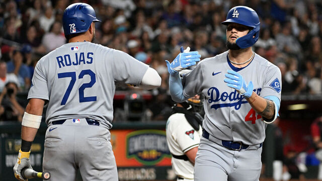 PHOENIX, ARIZONA - SEPTEMBER 24: Andy Pages #44 of the Los Angeles Dodgers celebrates his two-run home run with Miguel Rojas #72 in the fourth inning against the Arizona Diamondbacks at Chase Field on September 24, 2025 in Phoenix, Arizona.