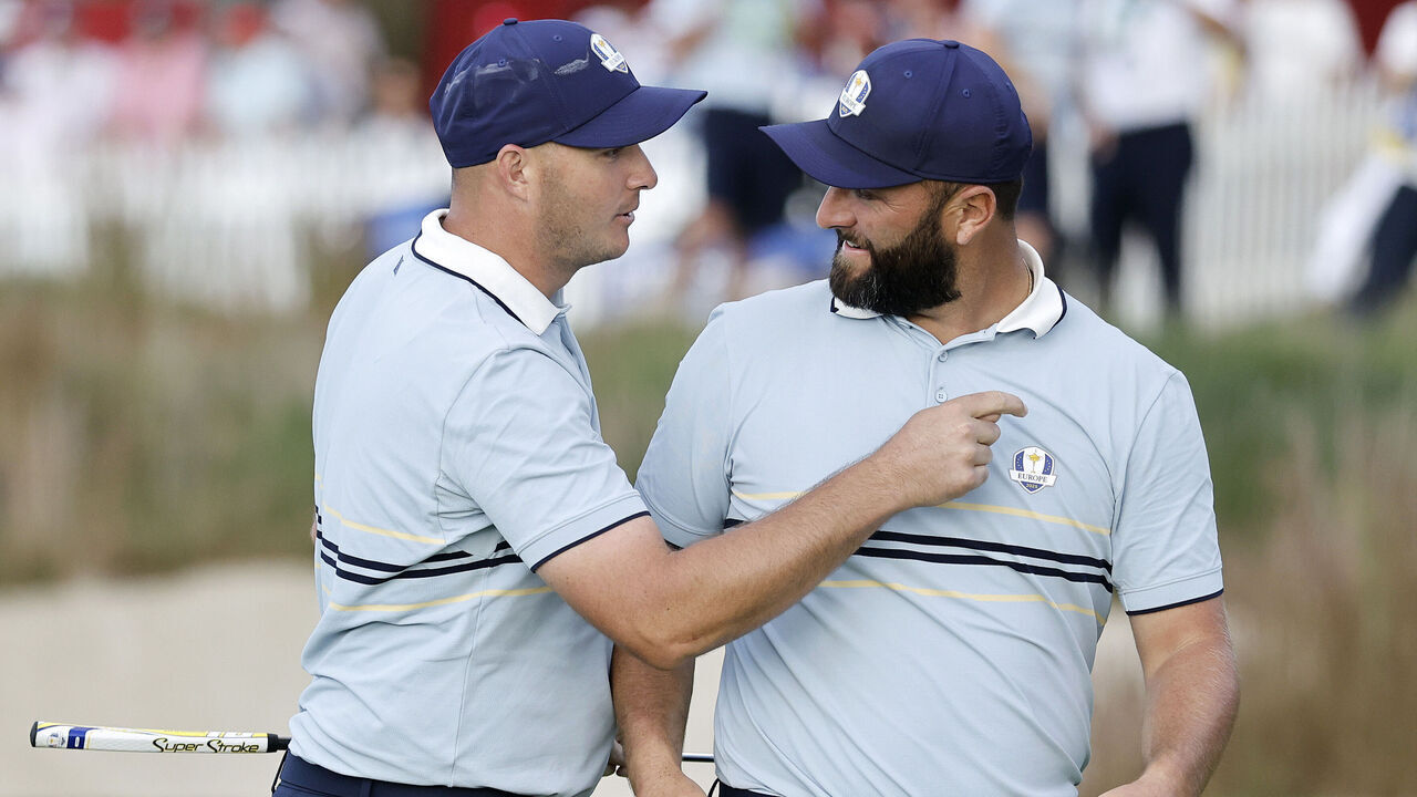 FARMINGDALE, NEW YORK - SEPTEMBER 26: Sepp Straka of Team Europe and teammate Jon Rahm celebrate after defeating J.J. Spaun and Scottie Scheffler of Team United States, 3&2, during the Friday afternoon four-ball matches of the 2025 Ryder Cup at Black Course at Bethpage State Park Golf Course on September 26, 2025 in Farmingdale, New York.