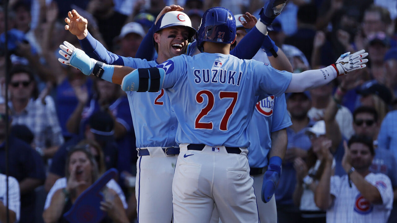 CHICAGO, ILLINOIS - SEPTEMBER 26: Seiya Suzuki #27 of the Chicago Cubs celebrates a grand slam with Nico Hoerner #2, Ian Happ #8 and Kyle Tucker #30 during the seventh inning against the St. Louis Cardinals at Wrigley Field on September 26, 2025 in Chicago, Illinois.