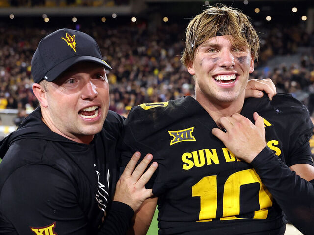 TEMPE, ARIZONA - SEPTEMBER 26: Head coach Kenny Dillingham celebrates with quarterback Sam Leavitt #10 of the Arizona State Sun Devils after defeating the TCU Horned Frogs 27-24 at Mountain America Stadium on September 26, 2025 in Tempe, Arizona.