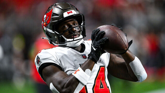 ATLANTA, GA OCTOBER 03: Tampa Bay wide receiver Chris Godwin (14) warms up prior to the start of the NFL game between the Tampa Bay Buccaneers and the Atlanta Falcons on October 3rd, 2024 at Mercedes-Benz Stadium in Atlanta, GA.