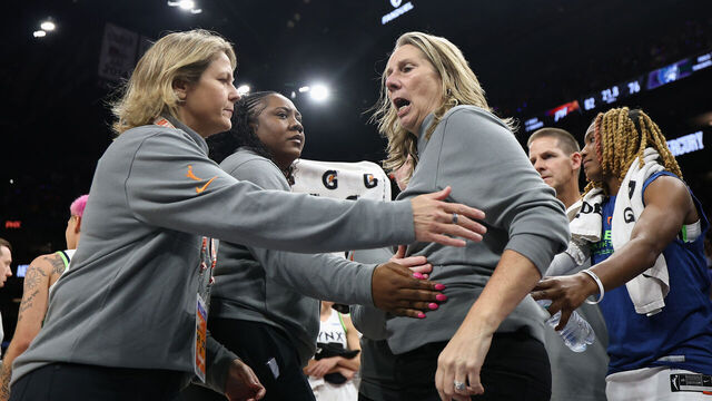 PHOENIX, ARIZONA - SEPTEMBER 26: Head coach Cheryl Reeve of the Minnesota Lynx is restrained by coaches after being ejected during the second half of Game Three of the 2025 WNBA Playoffs semifinals against the Phoenix Mercury at PHX Arena on September 26, 2025 in Phoenix, Arizona. The Mercury defeated the Lynx 84-76.