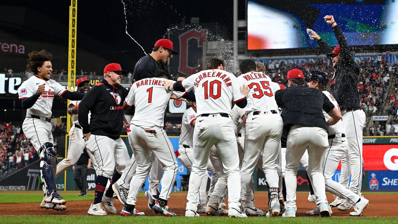 CLEVELAND, OHIO - SEPTEMBER 27: The Cleveland Guardians celebrate the team's 3-2 win over the Texas Rangers to clinch a spot in the American League Playoffs at Progressive Field on September 27, 2025 in Cleveland, Ohio.