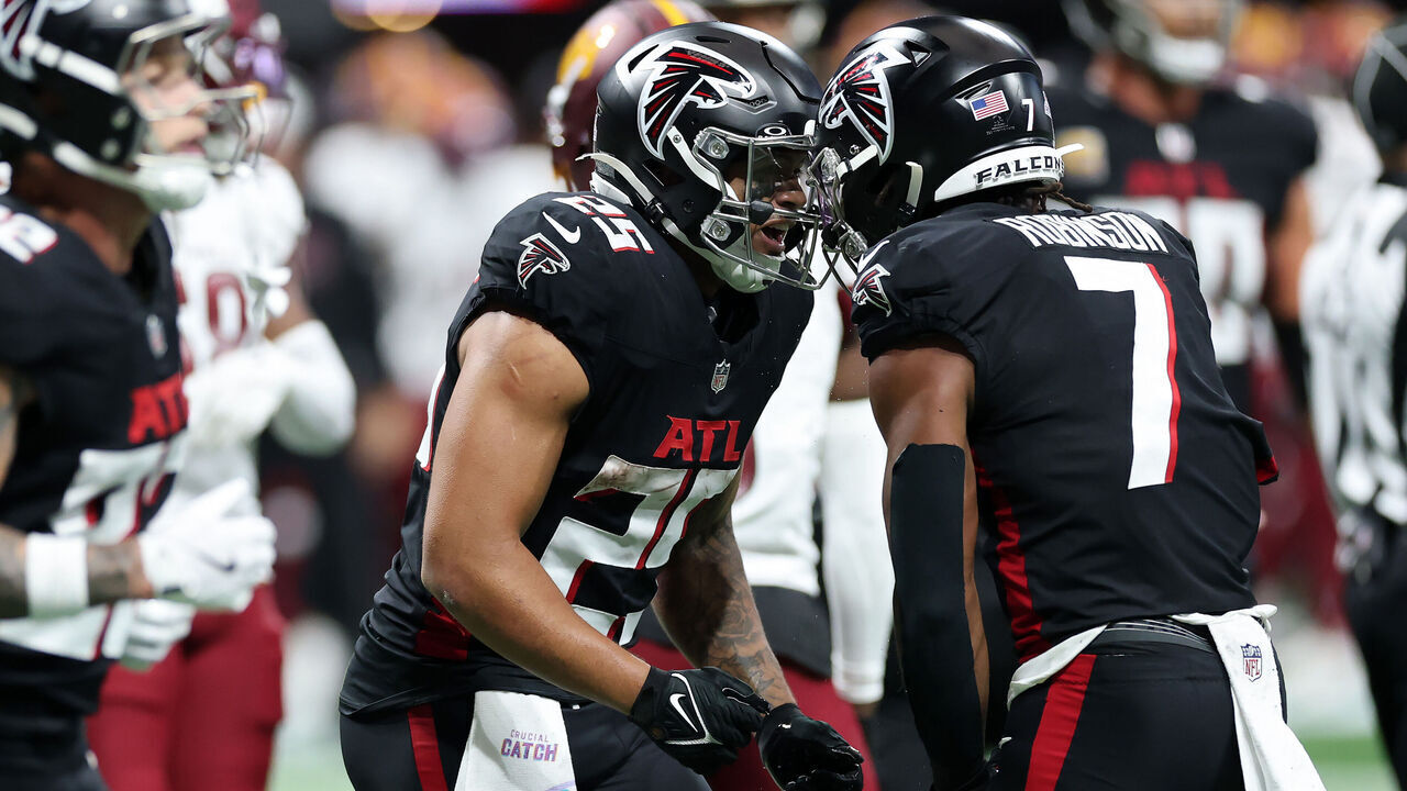ATLANTA, GEORGIA - SEPTEMBER 28: Tyler Allgeier #25 of the Atlanta Falcons celebrates a touchdown with Bijan Robinson #7 during the third quarter against the Washington Commanders at Mercedes-Benz Stadium on September 28, 2025 in Atlanta, Georgia.