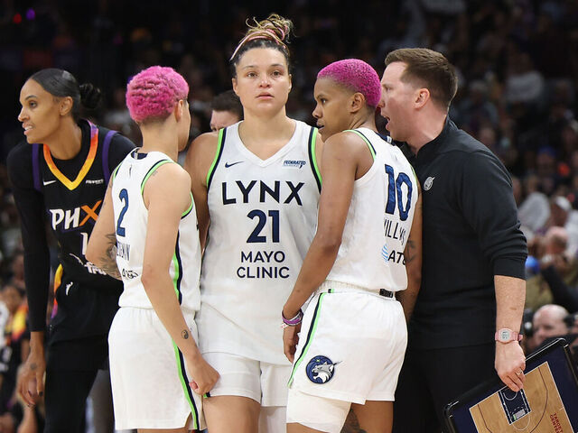 PHOENIX, ARIZONA - SEPTEMBER 28: Natisha Hiedeman #2, Kayla McBride #21 and Courtney Williams #10 of the Minnesota Lynx talk with acting head coach Eric Thibault during the second half of Game Four of the 2025 WNBA Playoffs semifinals at PHX Arena on September 28, 2025 in Phoenix, Arizona. The Mercury defeated the Lynx 86-81 to advance to the WNBA finals.