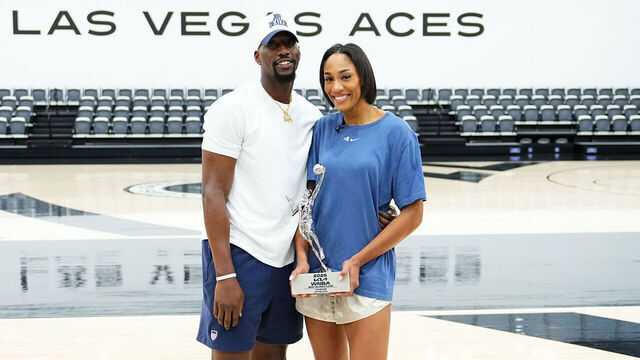 LAS VEGAS, NV - SEPTEMBER 19: A'ja Wilson #22 of the Las Vegas Aces and Bam Adebayo pose with the 2025 Kia WNBA Most Valuable Player award on September 19, 2025 at the Las Vegas Aces practice facility in Henderson, Nevada. Mandatory Copyright Notice: Copyright 2025 NBAE
