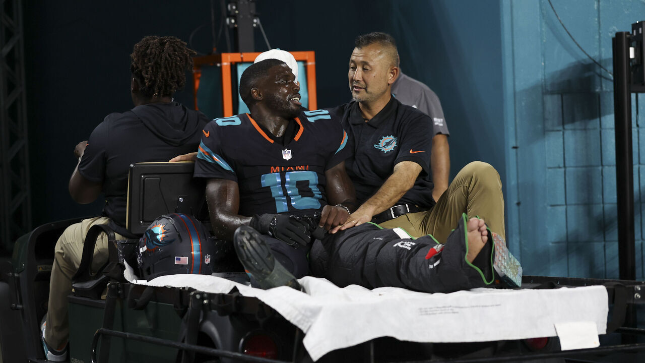 MIAMI GARDENS, FLORIDA - SEPTEMBER 29: Tyreek Hill #10 of the Miami Dolphins is carted off the field after sustaining an injury in the third quarter of a NFL football game against the New York Jets at Hard Rock Stadium on September 29, 2025 in Miami Gardens, Florida.