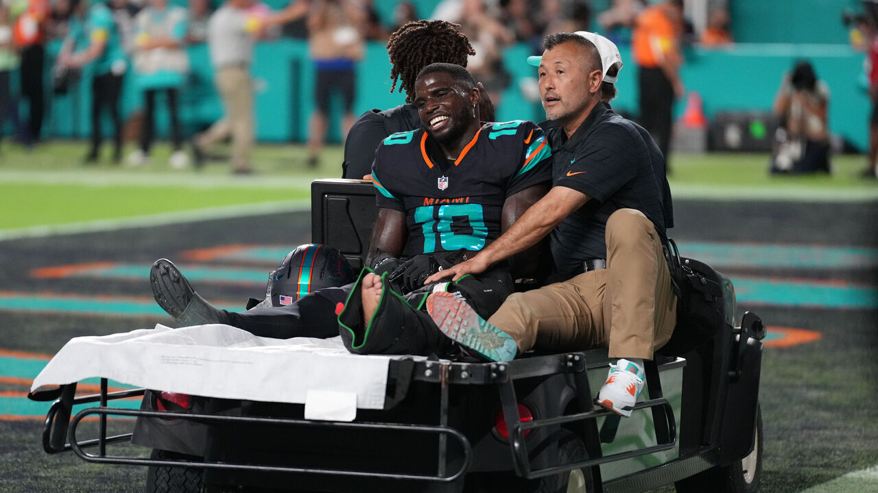 MIAMI GARDENS, FL - SEPTEMBER 29: Miami Dolphins wide receiver Tyreek Hill (10) leaves the field by cart after an injury during the game between the New York Jets and the Miami Dolphins on Monday, September 29, 2025 at Hard Rock Stadium in Miami, FL