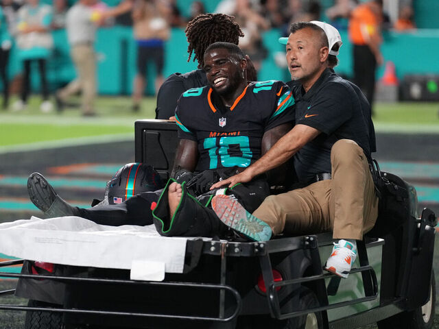 MIAMI GARDENS, FL - SEPTEMBER 29: Miami Dolphins wide receiver Tyreek Hill (10) leaves the field by cart after an injury during the game between the New York Jets and the Miami Dolphins on Monday, September 29, 2025 at Hard Rock Stadium in Miami, FL