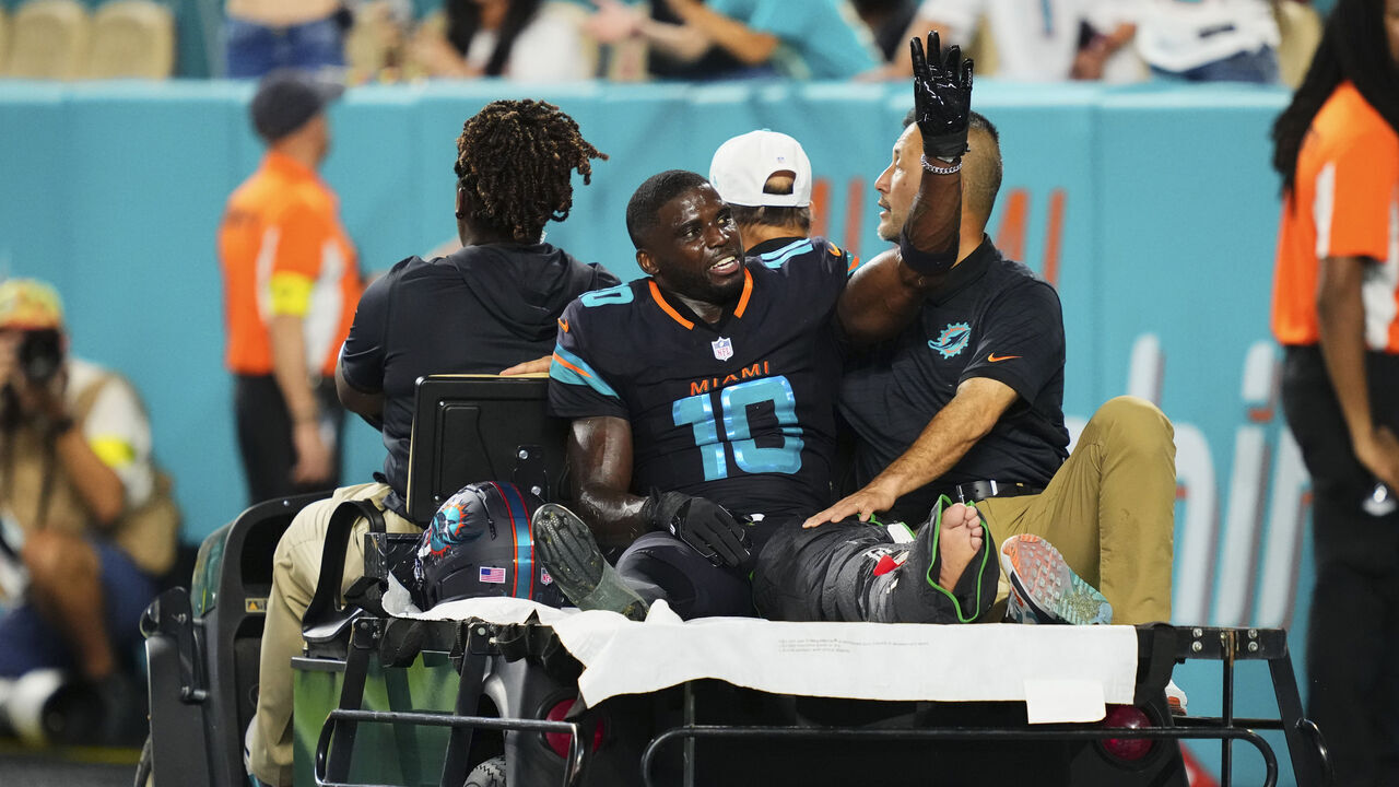 MIAMI GARDENS, FL - SEPTEMBER 29: Tyreek Hill#10 of the Miami Dolphins is carted off the field after suffering an injury against the New York Jets during an NFL football game at Hard Rock Stadium on September 29, 2025 in Miami Gardens, Florida.