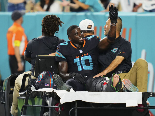 MIAMI GARDENS, FL - SEPTEMBER 29: Tyreek Hill#10 of the Miami Dolphins is carted off the field after suffering an injury against the New York Jets during an NFL football game at Hard Rock Stadium on September 29, 2025 in Miami Gardens, Florida.