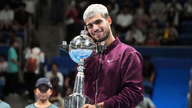 TOKYO, JAPAN - SEPTEMBER 30: Carlos Alcaraz of Spain poses with the trophy after defeating against Taylor Fritz of United States during the Singles Final on day seven of Kinoshita Group Japan Open at Ariake Colosseum on September 30, 2025 in Tokyo, Japan.