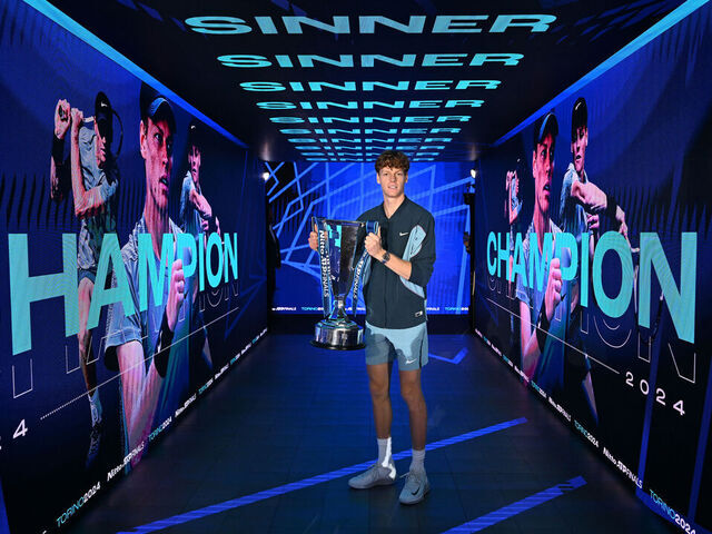 TURIN, ITALY - NOVEMBER 17: Jannik Sinner of Italy poses for a photo with the trophy after his victory against Taylor Fritz of United States during the Men's Singles final match during day eight of the Nitto ATP finals 2024 at Inalpi Arena on November 17, 2024 in Turin, Italy.