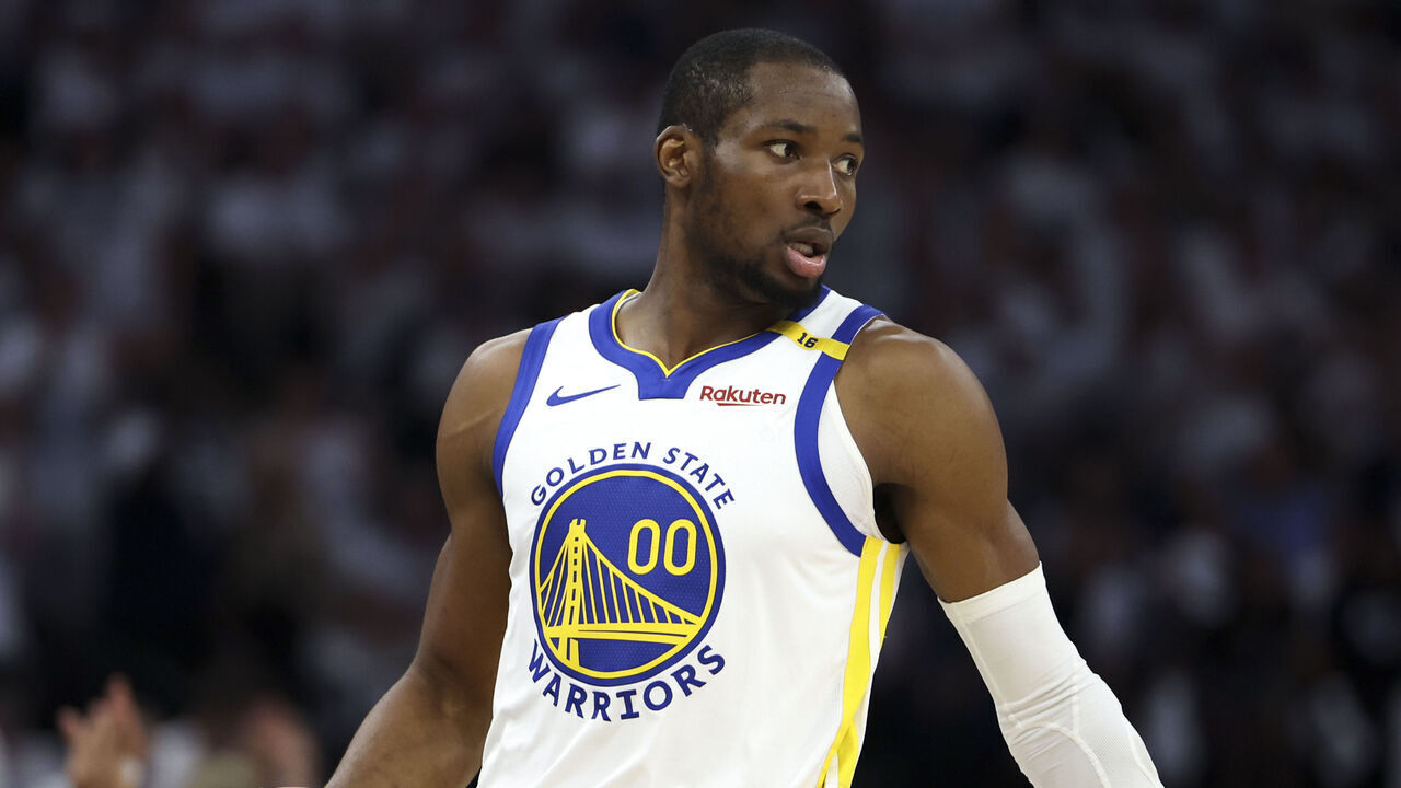 MINNEAPOLIS, MINNESOTA - MAY 14: Jonathan Kuminga #00 of the Golden State Warriors handles the ball during the first quarter of Game Five of the Western Conference Second Round NBA Playoffs against the Minnesota Timberwolves at Target Center on May 14, 2025 in Minneapolis, Minnesota.