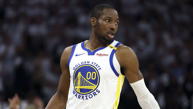 MINNEAPOLIS, MINNESOTA - MAY 14: Jonathan Kuminga #00 of the Golden State Warriors handles the ball during the first quarter of Game Five of the Western Conference Second Round NBA Playoffs against the Minnesota Timberwolves at Target Center on May 14, 2025 in Minneapolis, Minnesota.