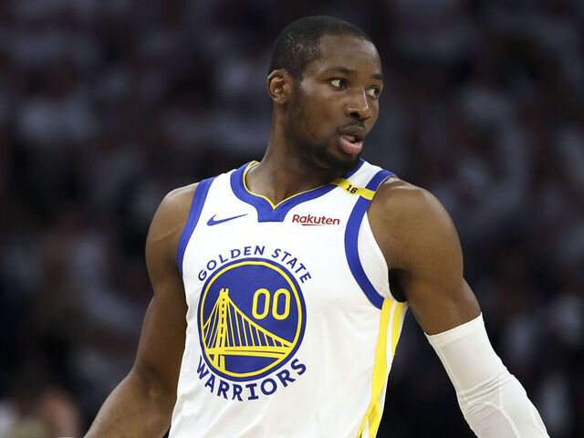 MINNEAPOLIS, MINNESOTA - MAY 14: Jonathan Kuminga #00 of the Golden State Warriors handles the ball during the first quarter of Game Five of the Western Conference Second Round NBA Playoffs against the Minnesota Timberwolves at Target Center on May 14, 2025 in Minneapolis, Minnesota.