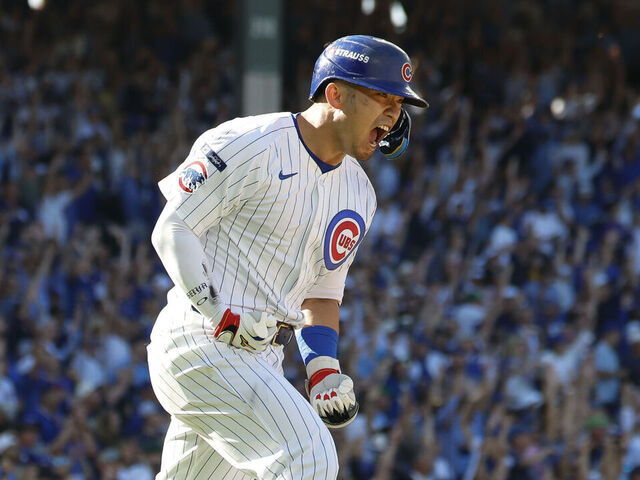 CHICAGO, ILLINOIS - SEPTEMBER 30: Seiya Suzuki #27 of the Chicago Cubs celebrates after hitting a solo home run during the fifth inning of game one of the National League Wild Card Series against the San Diego Padres at Wrigley Field on September 30, 2025 in Chicago, Illinois.