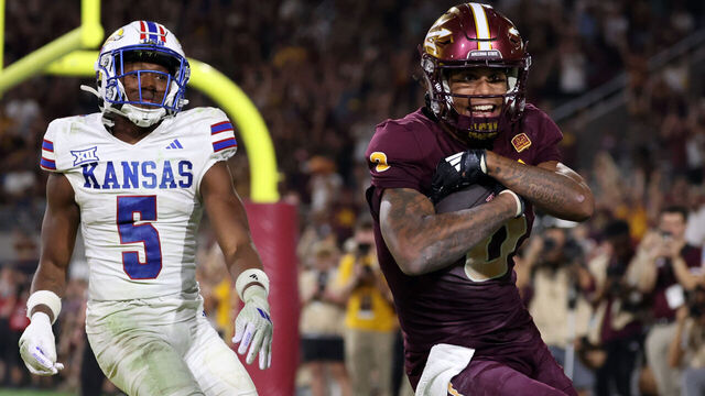 TEMPE, ARIZONA - OCTOBER 05: Wide receiver Jordyn Tyson #0 of the Arizona State Sun Devils celebrates after scoring the go ahead touchdown over safety O.J. Burroughs #5 of the Kansas Jayhawks during the fourth quarter at Mountain America Stadium on October 05, 2024 in Tempe, Arizona.