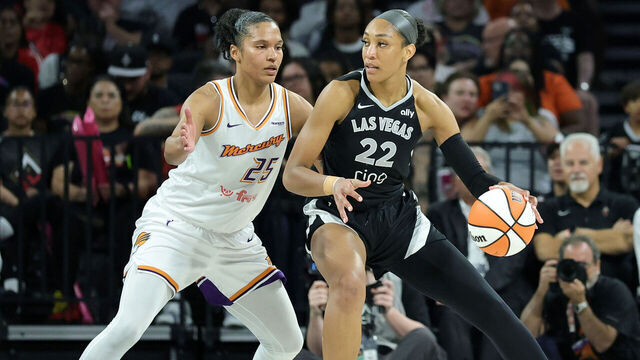 LAS VEGAS, NEVADA - AUGUST 21: A'ja Wilson #22 of the Las Vegas Aces is guarded by Alyssa Thomas #25 of the Phoenix Mercury in the second quarter of their game at Michelob ULTRA Arena on August 21, 2025 in Las Vegas, Nevada. The Aces defeated the Mercury 83-61.