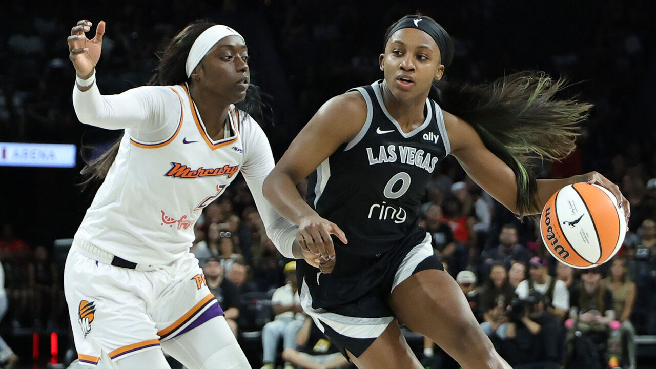 LAS VEGAS, NEVADA - AUGUST 21: Jackie Young #0 of the Las Vegas Aces drives against Kahleah Copper #2 of the Phoenix Mercury in the third quarter of their game at Michelob ULTRA Arena on August 21, 2025 in Las Vegas, Nevada. The Aces defeated the Mercury 83-61.