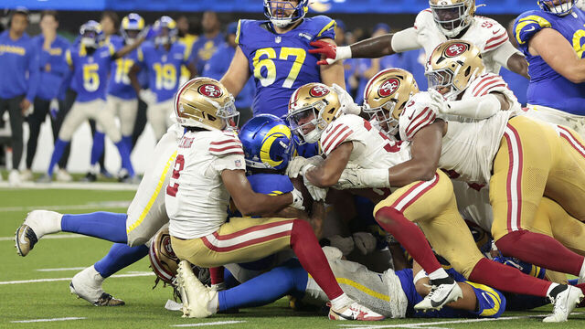 INGLEWOOD, CALIFORNIA - OCTOBER 02: Kyren Williams #23 of the Los Angeles Rams is stopped short on fourth down during overtime to lose to the San Francisco 49ers 26-23 at SoFi Stadium on October 02, 2025 in Inglewood, California.