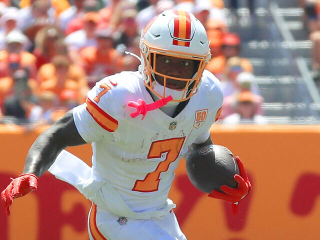 TAMPA, FL - SEPTEMBER 21: Tampa Bay Buccaneers Running Back Bucky Irving (7) carries the ball during the Regular Season game between the New York Jets and the Tampa Bay Buccaneers on September 21, 2025 at Raymond James Stadium in Tampa, Florida.
