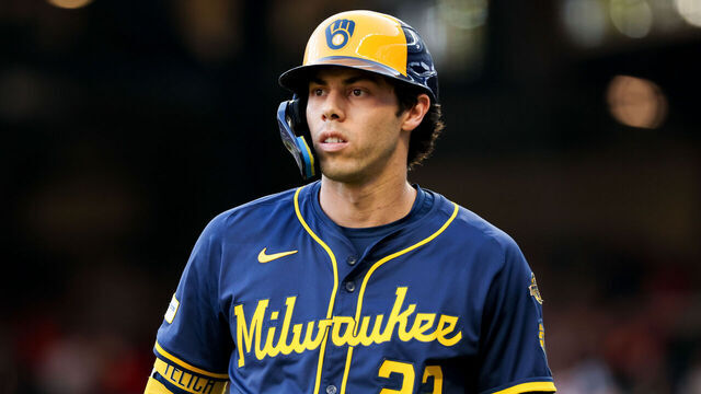 ATLANTA, GEORGIA - AUGUST 6: Christian Yelich #22 of the Milwaukee Brewers walks back to the dugout during the first inning against the Atlanta Braves at Truist Park on August 6, 2025 in Atlanta, Georgia.
