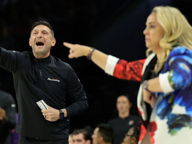 LAS VEGAS, NEVADA - MAY 14: Head coach Nate Tibbetts (L) of the Phoenix Mercury and head coach Becky Hammon of the Las Vegas Aces gesture to their players in the first quarter of their game at Michelob ULTRA Arena on May 14, 2024 in Las Vegas, Nevada. The Aces defeated the Mercury 89-80.