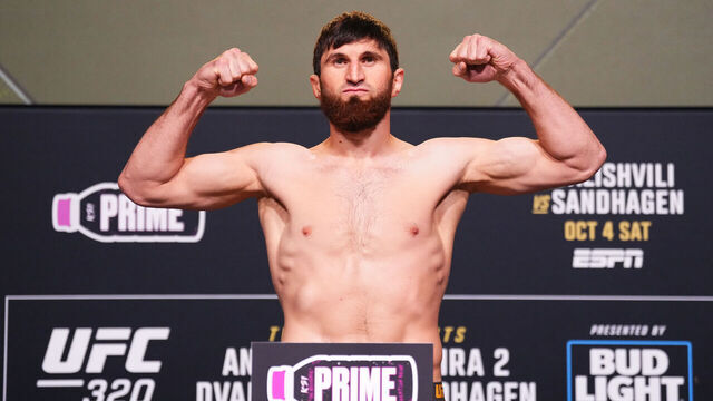 LAS VEGAS, NEVADA - OCTOBER 03: Magomed Ankalaev of Russia poses on the scale during the UFC 320 official weigh-ins at UFC Apex on October 03, 2025 in Las Vegas, Nevada.